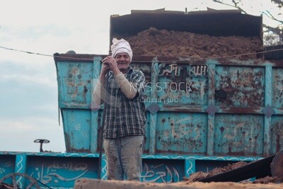 Man standing in front of the brick factory, brick industry
