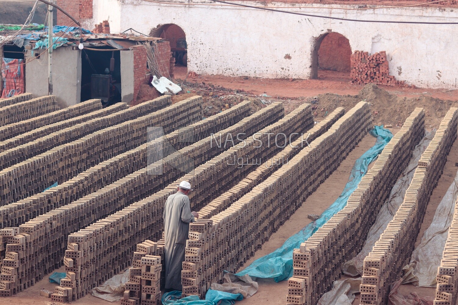 View of brick factory in front of the river, brick industry