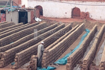 View of brick factory in front of the river, brick industry
