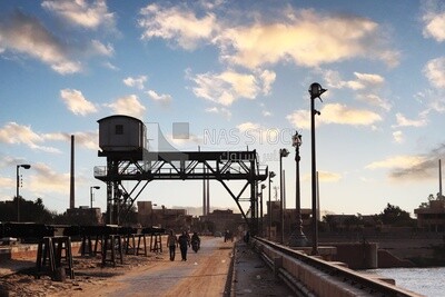 People walking on a bridge in el-gharbia