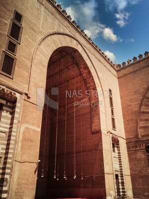 The entrance of the Sultan Hassan Mosque in Cairo, History, Tourism in Egypt