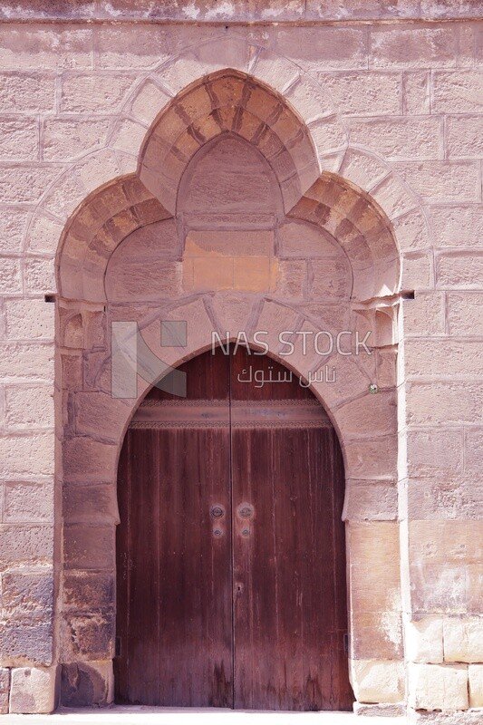 One of the doors of the Caliph mosques, worship and getting closer to God, the call for Muslims to pray, landmarks of the Prophet’s Mosque, and Islamic world tourism