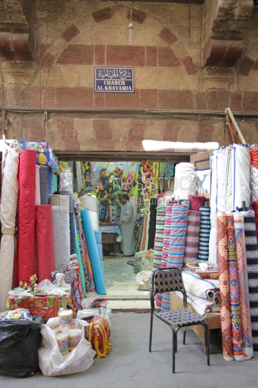 View of a shop selling fabric in the street, handmade, street