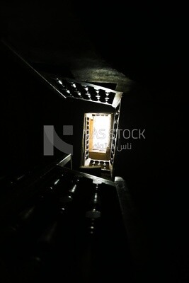 View of an old staircase winding spiral, History, Tourism in Egypt