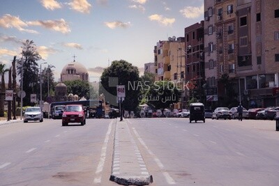 View of the street while cars walking