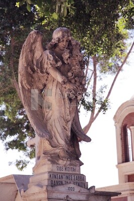 Statue in the small Coptic cemetery located inside a historical Christian district