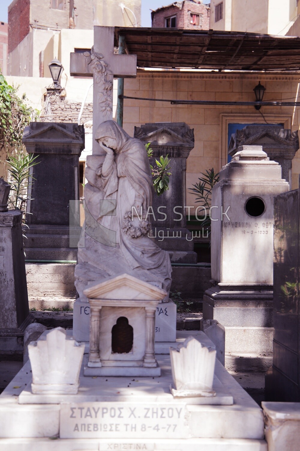 Statue in the small Coptic cemetery located inside a historical Christian district