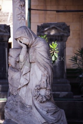 Statue in the small Coptic cemetery located inside a historical Christian district