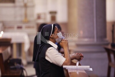 Nun wearing a mask