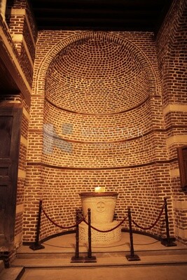 Cylindrical baptismal font located in the portico of the Abu Sarga Church , Cairo, Egypt