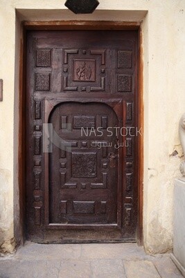 Wooden aged engraved decorated door ,Cairo, Egypt.