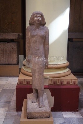 Pharaonic statue of a woman displayed in the Egyptian Museum, Egypt.