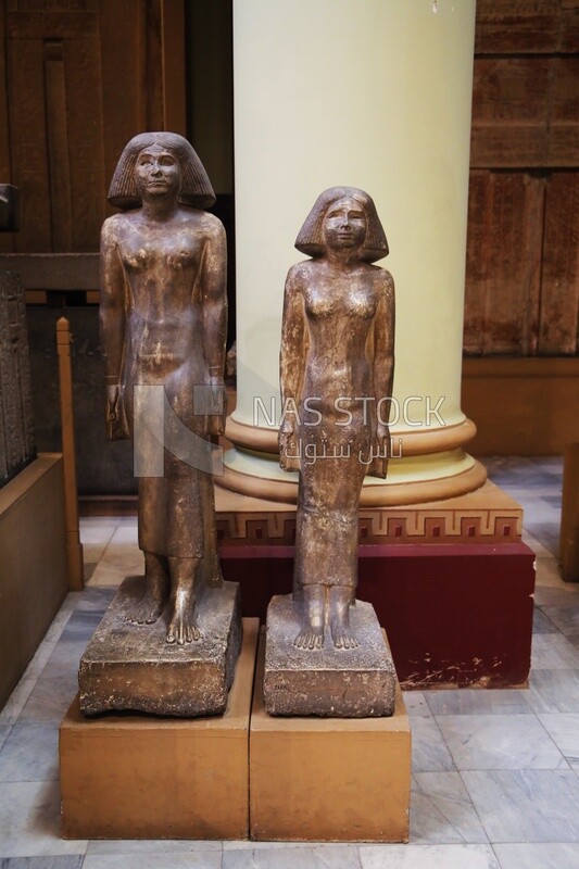 Statues of women are displayed in the Egyptian Museum.