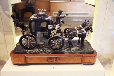 Model of an ancient Egyptian horse-drawn carriage in the Royal Chariot Museum, tourism in Egypt