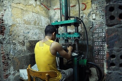 Craftsman working on a machine