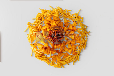 Crispy corn snacks and potato chips