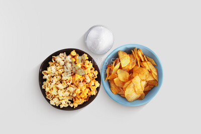 Crispy corn snacks and potato chips