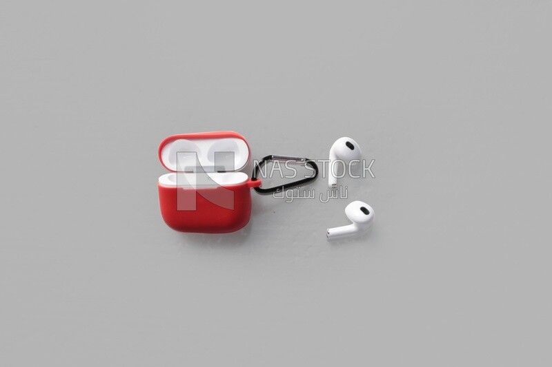 AirPods with red cover