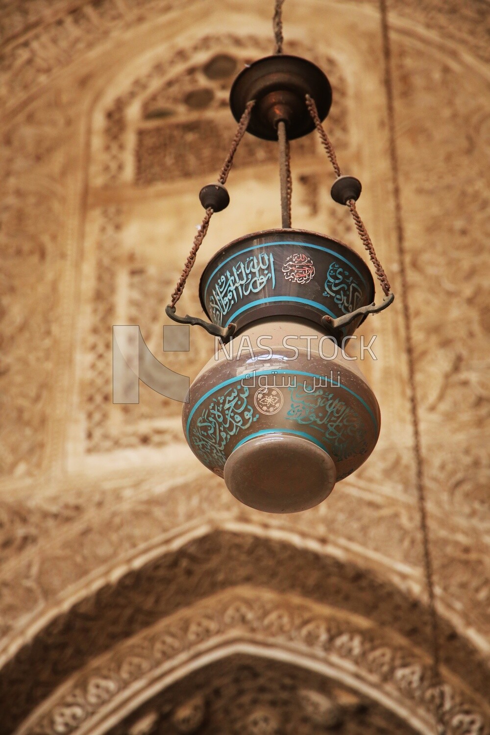 Glass lantern hung on the ceiling of The School and Dome of Sultan Al-Nasir Qalawun, History, Tourism in Egypt