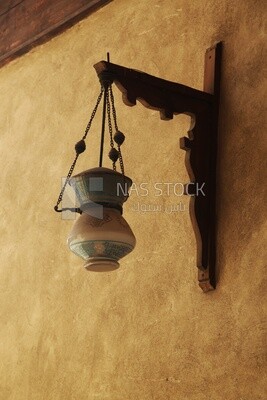 Arabic glass street lantern hung on a wooden pole, The School and dome of Sultan Al-Nasir Qalawun
