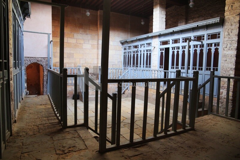 Changing rooms with blue wooden door shutters and wooden balustrades in The Sultan Inal Bath, a public bath built by Sultan Al-Ashraf Inal, El-Moez Street, Cairo, Egypt