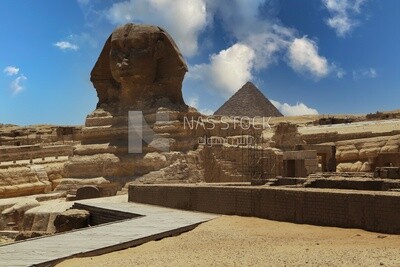 View of the Giza Pyramid behind the Great Sphinx, Tourism in Egypt, famous landmarks in Egypt, the beauty of the scenic landscapes