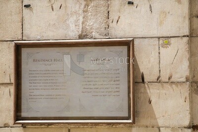 Sign with the name of the residence palace hanging on the wall