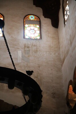 Birds standing on hanging lamps in the Beshtak Palace, History, Ancient palace