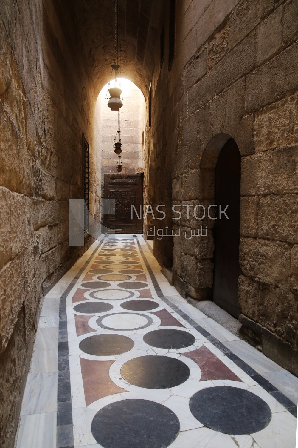 Arched corridor leading to the courtyard of Sultan Barquq mosque, tourism in Egypt,  El-Moez Street, Cairo, Egypt
