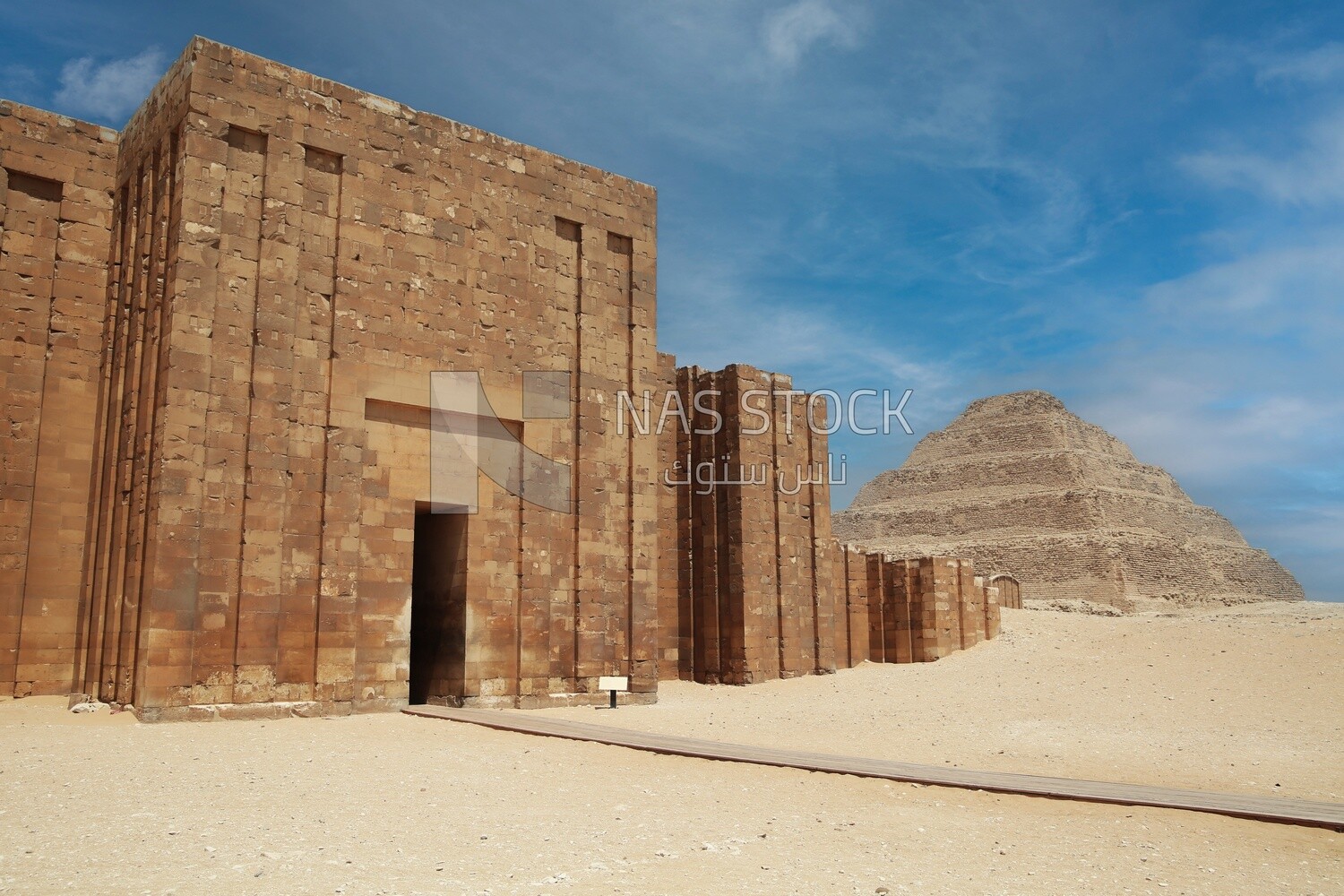The Entrance to the Columnal Hall of Saqqara and Pyramid of Djoser (Step Pyramid), the largest group of ancient Egyptian tombs, Tourism in Egypt