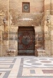 Wooden decorated door at Sultan Barquq mosque, tourism in Egypt,  El-Moez Street, Cairo, Egypt