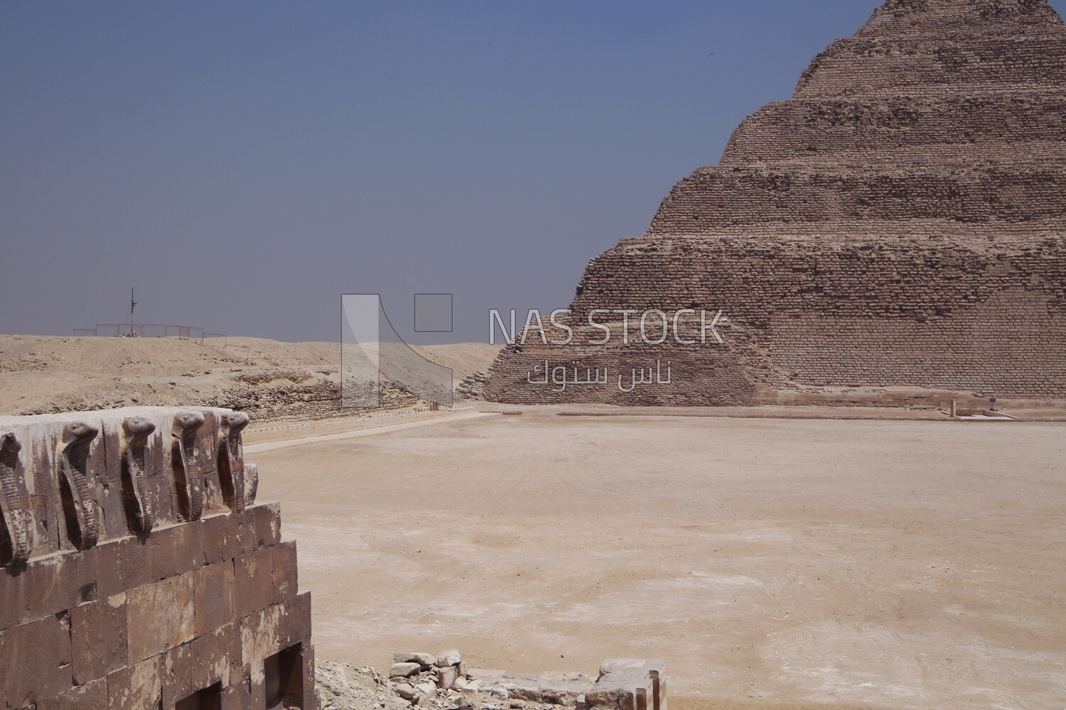 Cobra carved on top of a wall in the Pyramid Complex of Djoser, the largest group of ancient Egyptian tombs, Tourism in Egypt