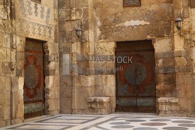Wooden decorated door at Sultan Barquq mosque, tourism in Egypt,  El-Moez Street, Cairo, Egypt