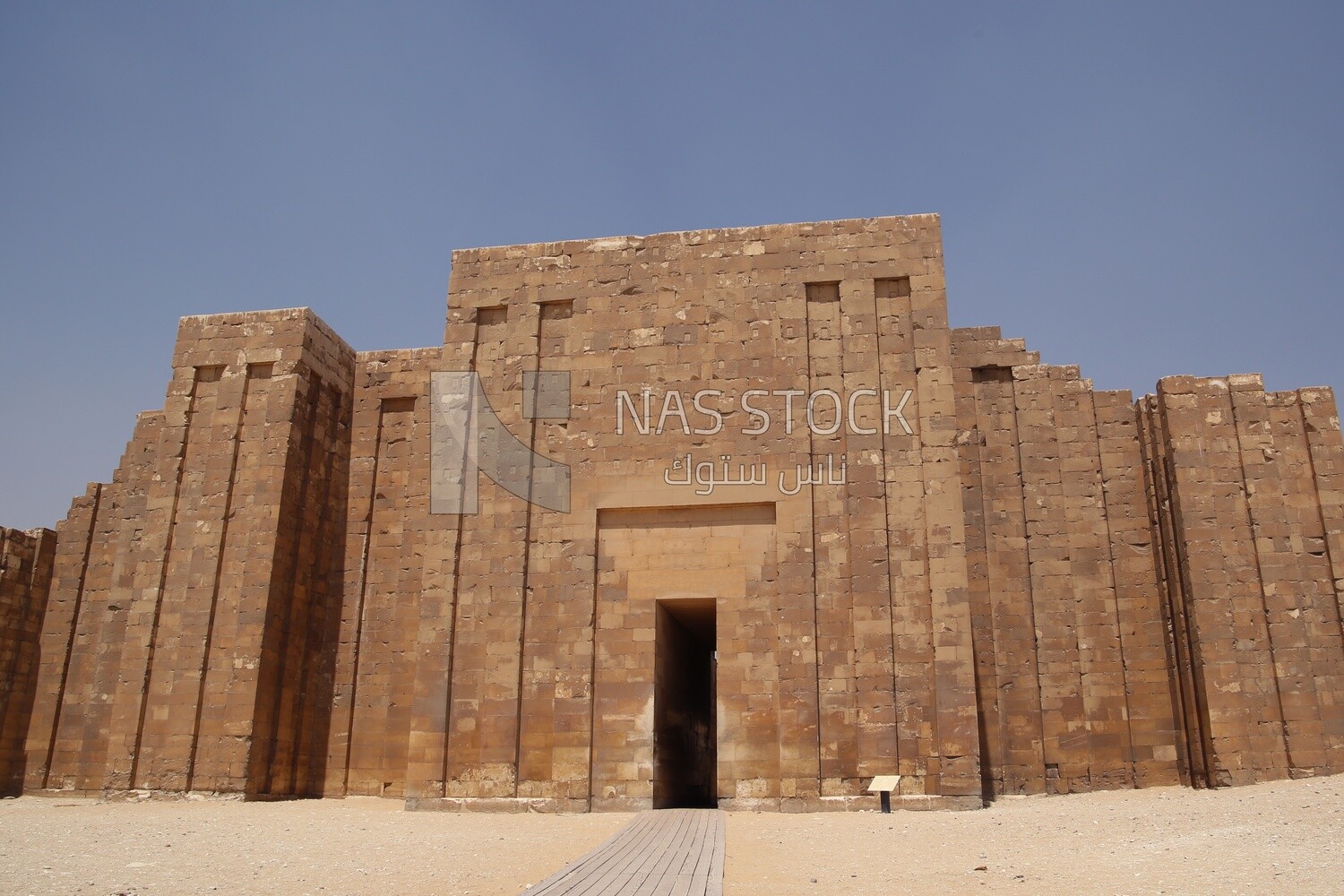 The Entrance to the Columnal Hall of Saqqara and Pyramid of Djoser (Step Pyramid), the largest group of ancient Egyptian tombs, Tourism in Egypt