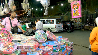 View of a People in the street buying the candies of the prophet Muhammad&#39;s birth