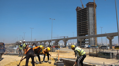 Engineers working in a building site at the new administrative capital, construction