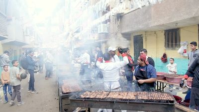 men standing in front of the grill cooking, Ramadan Kareem, preparing their iftar