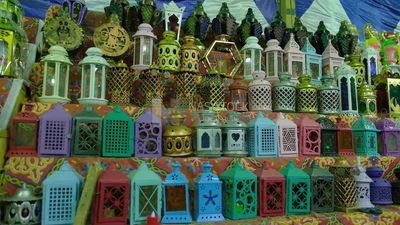Close up of a group of copper lanterns in a shop in Cairo