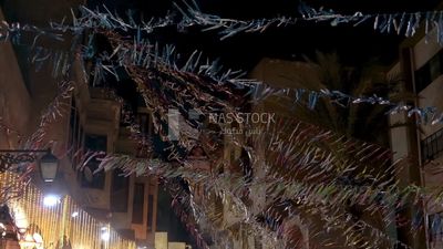 Hanging Ramadan lanterns in the street, decoration lights