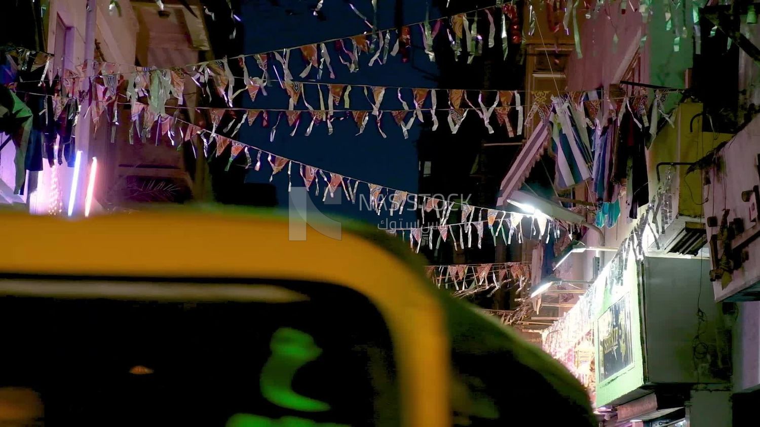 Hanging Ramadan lanterns in the street, decoration lights
