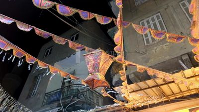 Hanging Ramadan lanterns in the street, decoration lights