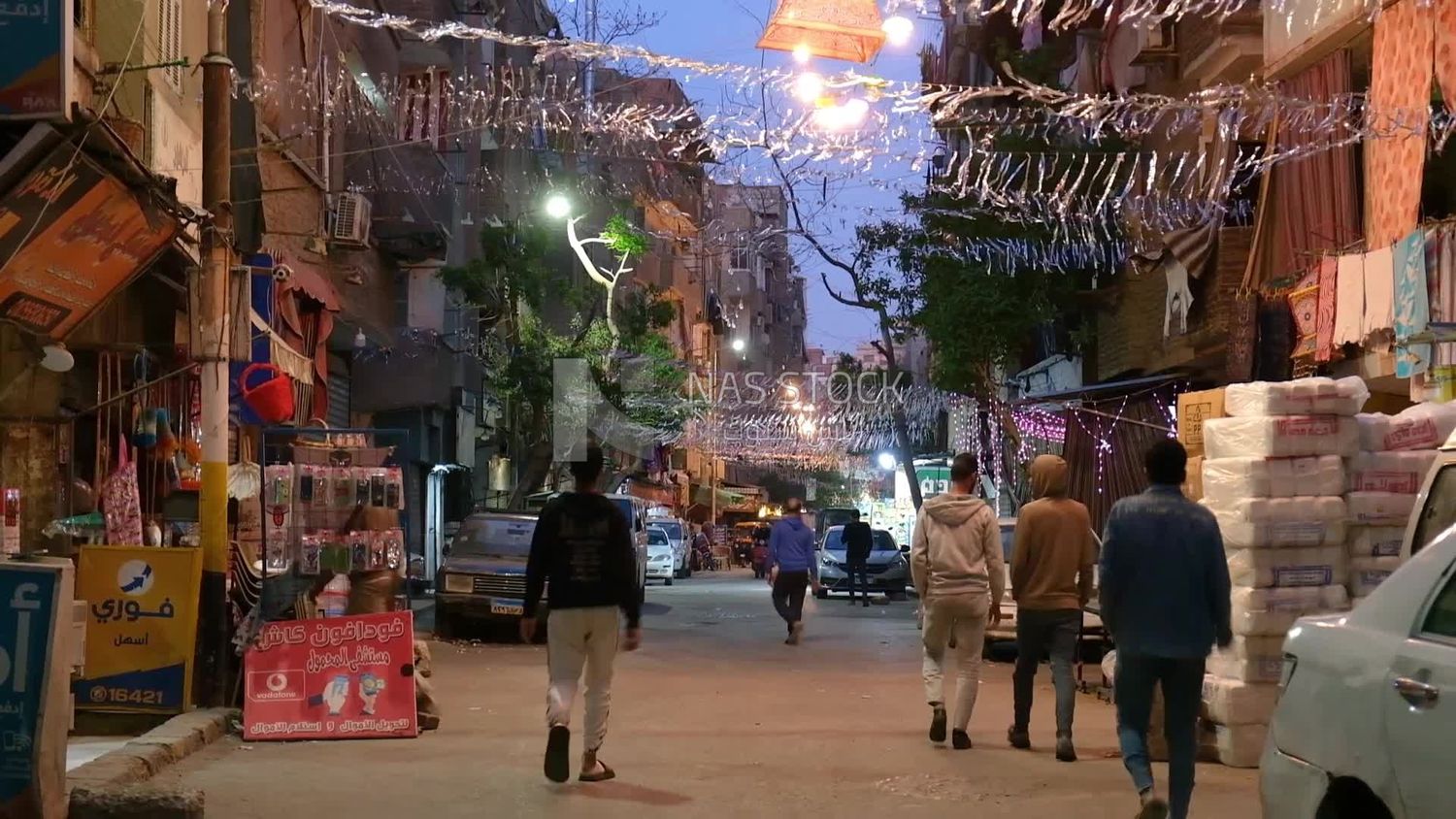 Hanging Ramadan lanterns in the street, decoration lights