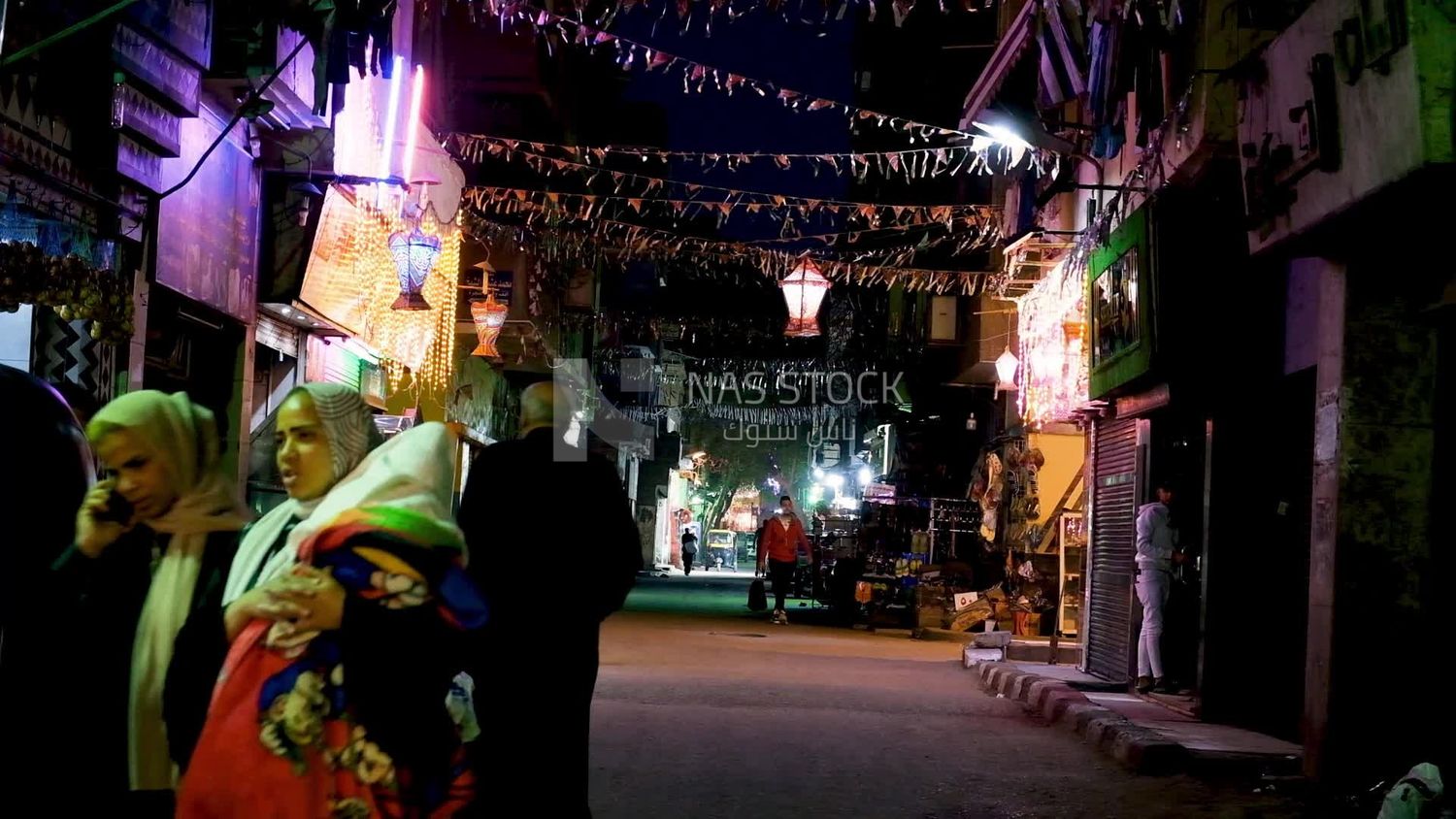 People walking in the street, Ramadan Kareem