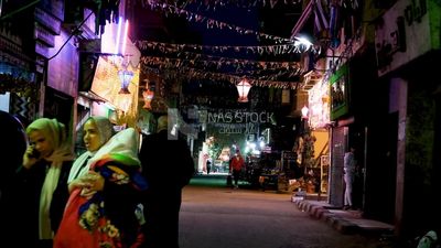 People walking in the street, Ramadan Kareem