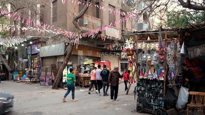 People walking in the street, Ramadan Kareem