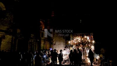 People on Al Moez Street at night, decoration lights