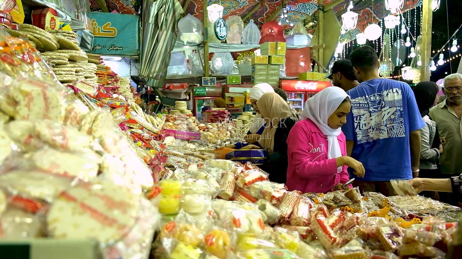 View of a People in the street buying the candies of the prophet Muhammad&#39;s birth