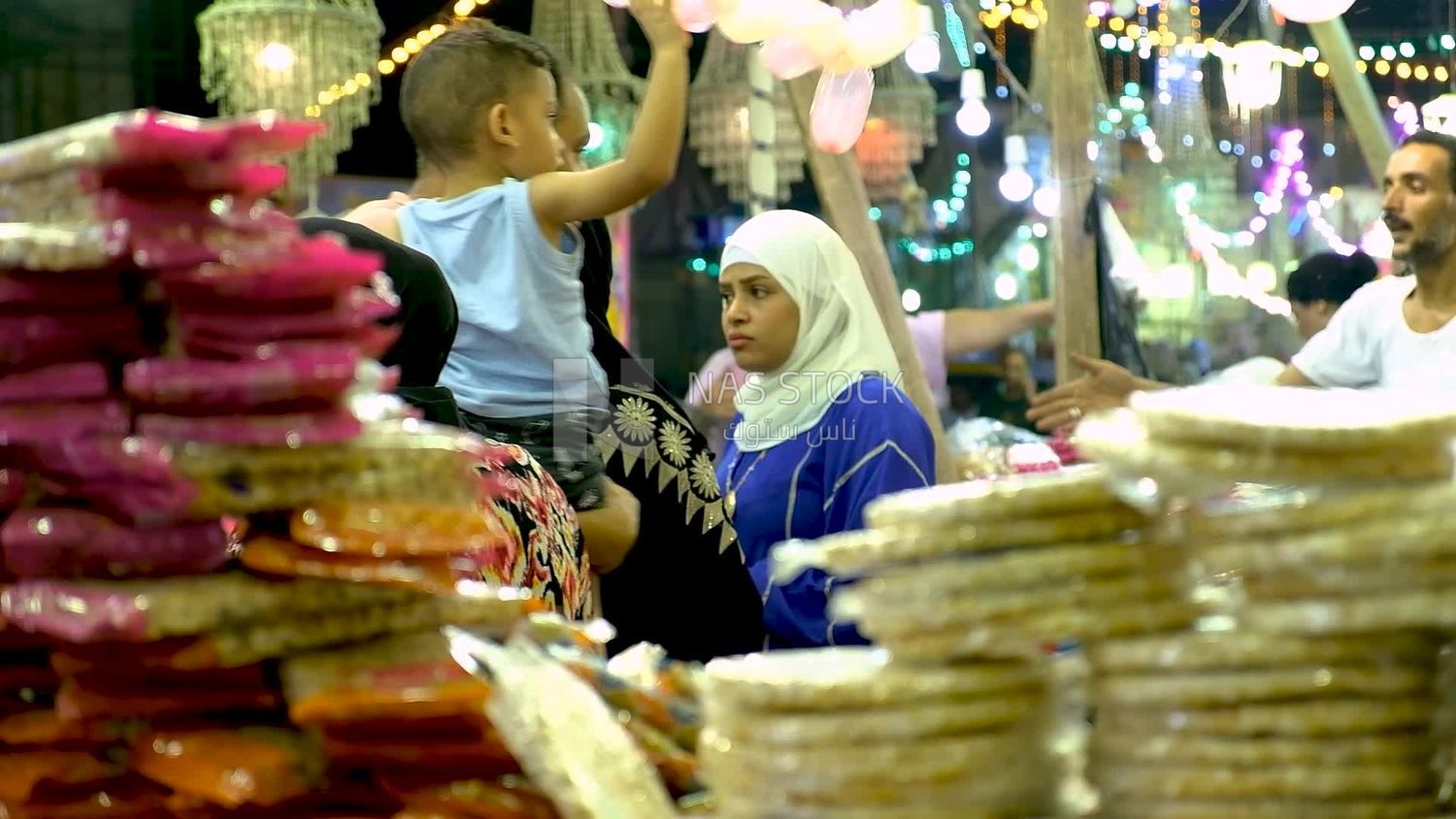 View of a People in the street buying the candies of the prophet Muhammad&#39;s birth