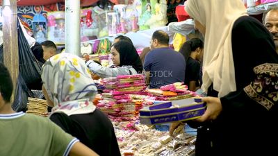 View of a People in the street buying the candies of the prophet Muhammad&#39;s birth