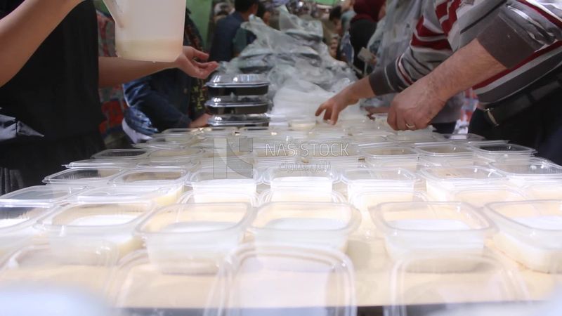 People prepare sweets to distribute for iftar,  Ramadan Kareem, preparing their iftar